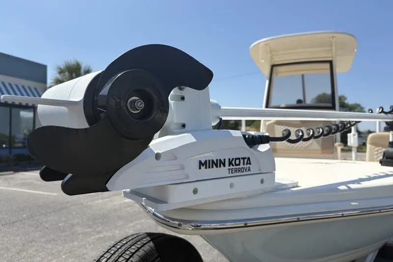 Slide: The Image of Minn Kota Terrova motor on 2022 Scout 231 XSB boat, outdoor setting. - 24