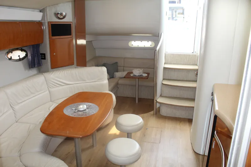 Slide: The Image of Interior of 2004 Formula 40 Performance Cruiser with elegant seating and wooden accents. - 21