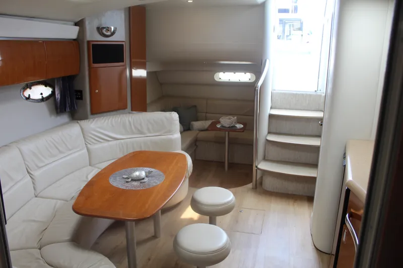 Slide: The Image of Interior of 2004 Formula 40 Performance Cruiser with elegant seating and wooden accents. - 22