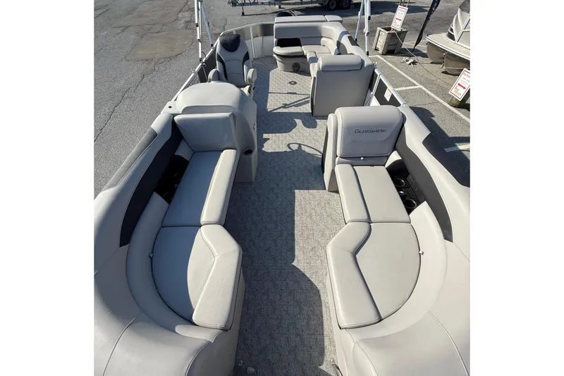 Slide: The Image of 2025 Berkshire 24CL 2.75 LE pontoon boat interior with spacious seating and modern design. - 10