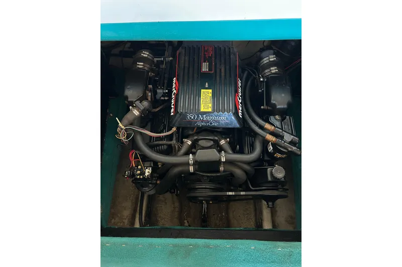 Slide: The Image of Engine of 1991 Wellcraft 232 Eclipse boat, featuring MerCruiser 350 Magnum Alpha One. - 12