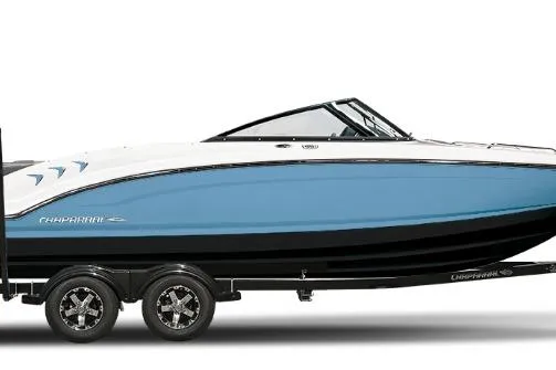 Slide: The Image of 2026 Chaparral 21 SSi OB boat, blue and white design, on a trailer. - 2
