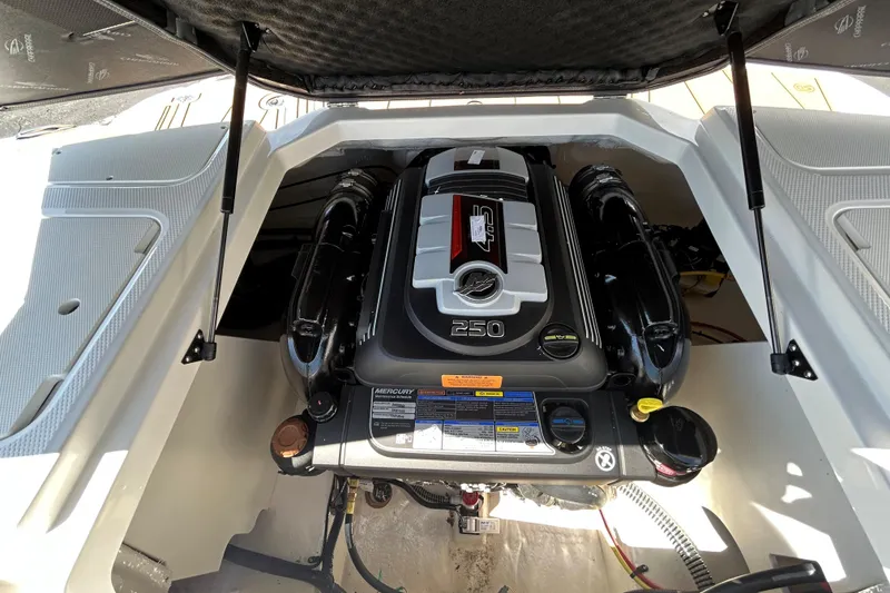 Slide: The Image of 2026 Chaparral 21 SSi boat engine compartment with Mercury 250 horsepower engine. - 12