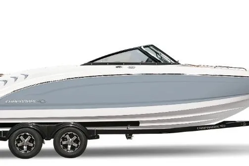 Slide: The Image of 2026 Chaparral 21 SSi boat, sleek design, dual-axle trailer, side view. - 3
