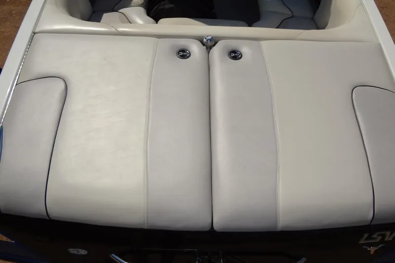 Slide: The Image of 2007 Malibu Wakesetter 23 LSV boat interior with beige upholstery. - 22