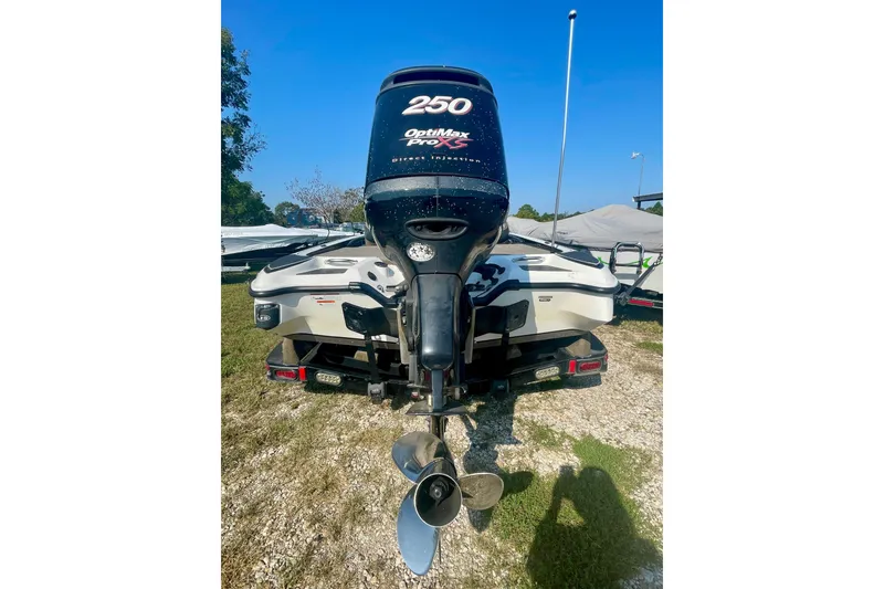 Slide: The Image of 2012 Triton 21 XS Elite boat with Optimax Pro XS engine, rear view. - 8