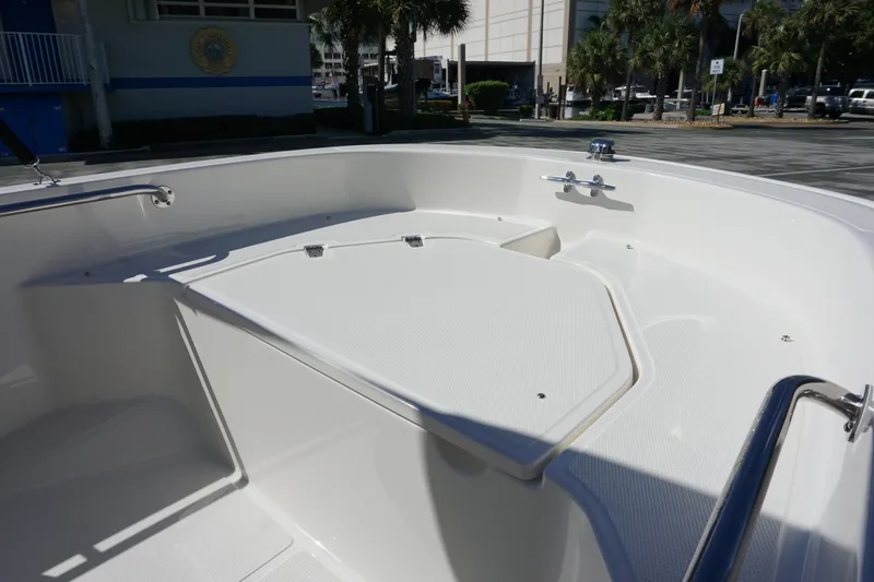 Slide: The Image of 2026 Boston Whaler 130 Super Sport boat interior, showcasing spacious seating and sleek design. - 18