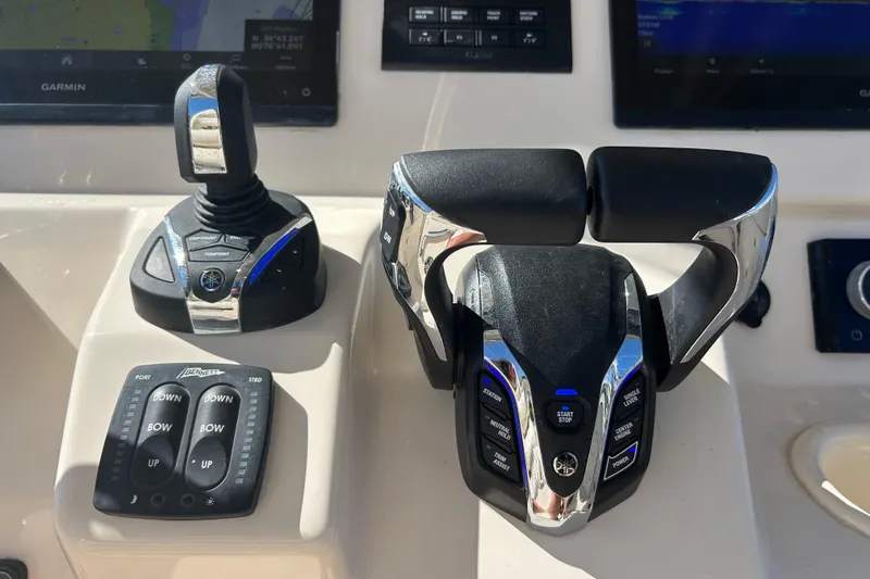 Slide: The Image of Control panel of a 2020 Grady-White Canyon 306 boat with advanced navigation systems. - 25