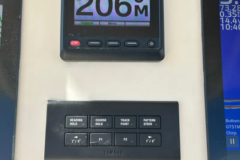 Slide: The Image of Control panel of a 2020 Grady-White Canyon 306 boat with Yamaha navigation system. - 27