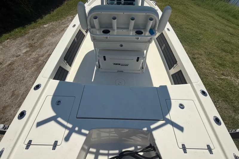 Slide: The Image of 2026 Pathfinder 2200 TRS boat interior with seating and storage compartments. - 12