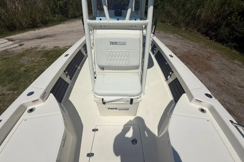 Slide: The Image of 2026 Pathfinder 2200 TRS boat interior with seating and storage compartments. - 43