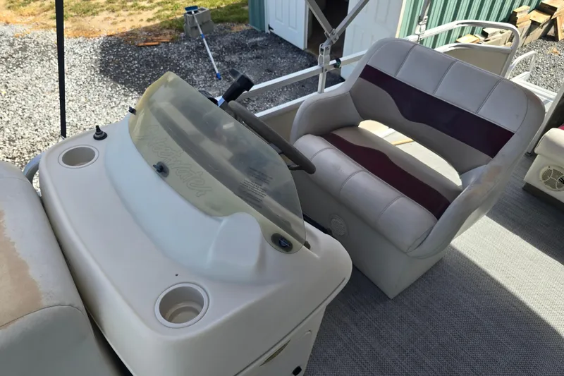 Slide: The Image of Honda 90 VTEC outboard motor on a Sweetwater 2019RE boat, 2003 model. - 23
