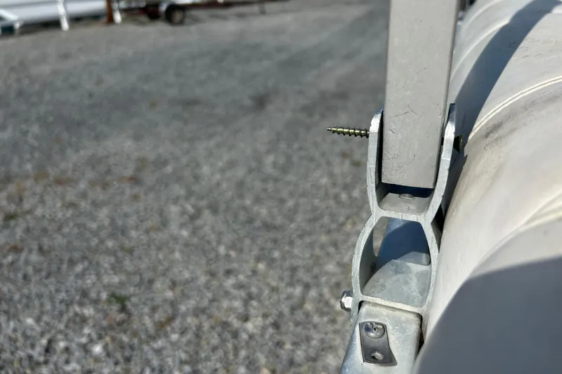 Slide: The Image of Sweetwater 2019RE boat interior with white and maroon seating, 2003 model. - 31