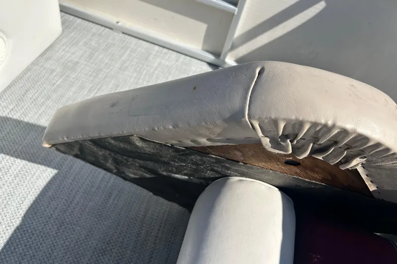 Slide: The Image of Boat capacity label for 11 persons or 1530 lbs, model 2019RE, year 2003. - 33