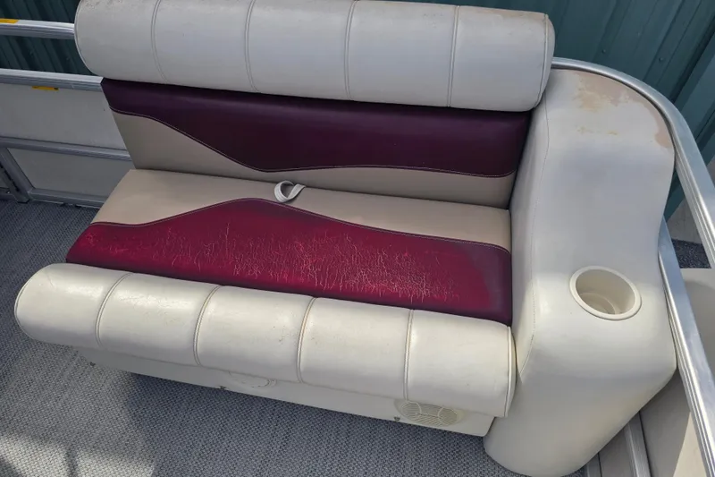 Slide: The Image of Pontoon boat seating with red and beige upholstery, SWEET WATER 2019RE model, 2003. - 42