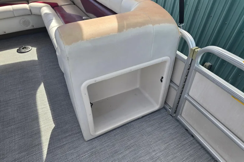 Slide: The Image of Pontoon boat seating with maroon and beige upholstery, SWEET WATER 2019RE model, 2003. - 44