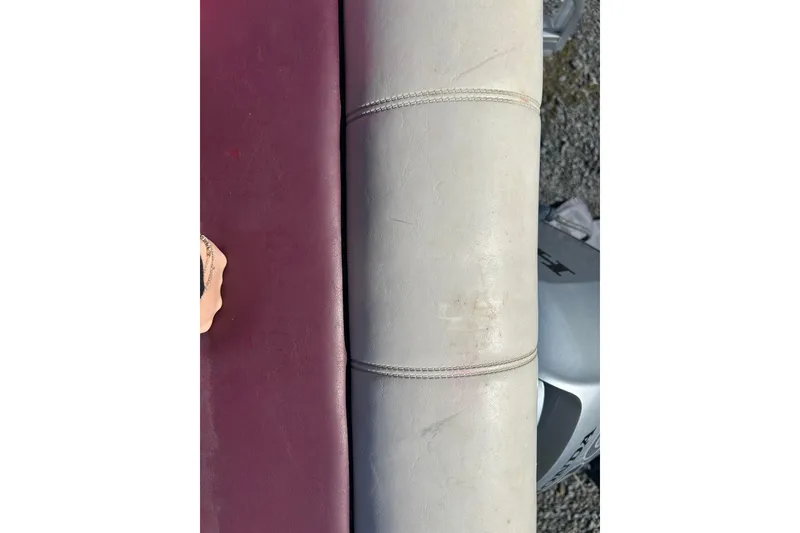 Slide: The Image of White and maroon boat seat with cup holder, SWEET WATER 2019RE, 2003 model. - 48