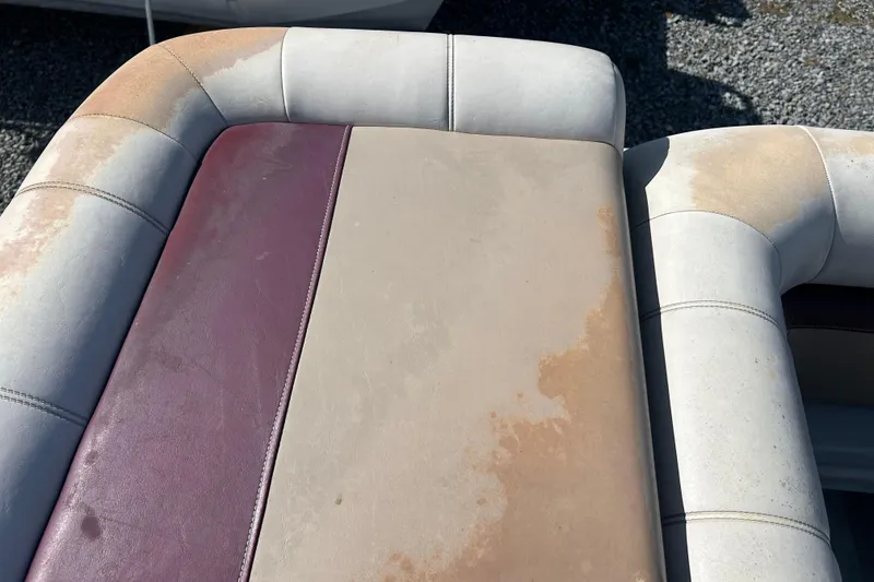 Slide: The Image of Cracked red upholstery on SWEET WATER 2019RE, 2003 model boat seat. - 49