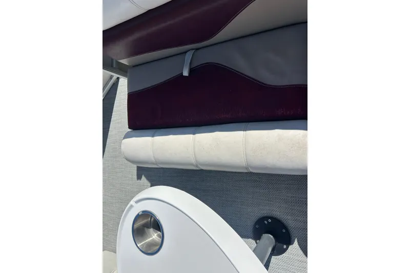 Slide: The Image of Interior of a 2003 SWEET WATER 2019RE boat with seating and storage compartment. - 50