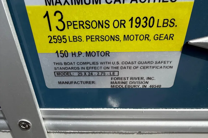 Slide: The Image of 2025 Berkshire 24RFX LE 2.75 boat capacity label, 13 persons, 150 HP motor. - 15