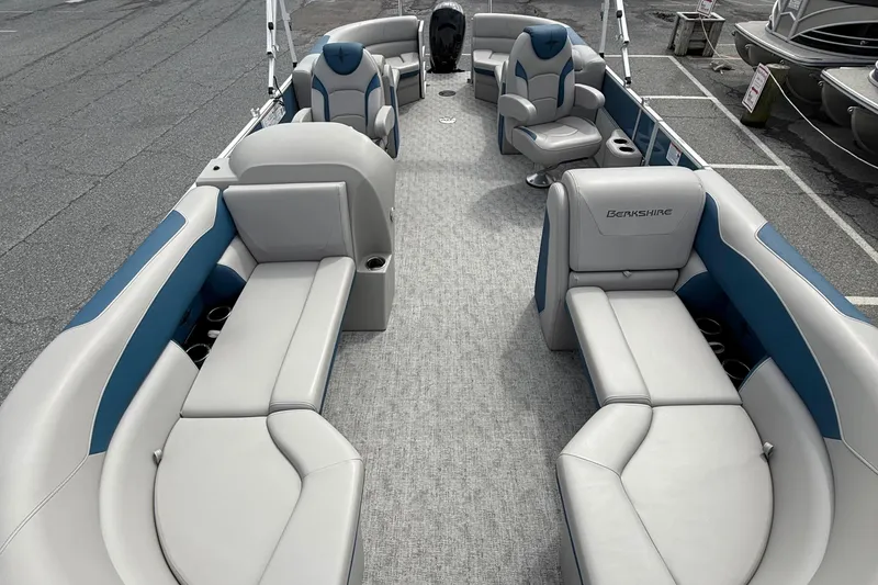 Slide: The Image of 2025 Berkshire 24RFX LE 2.75 pontoon boat interior with plush seating and modern design. - 8