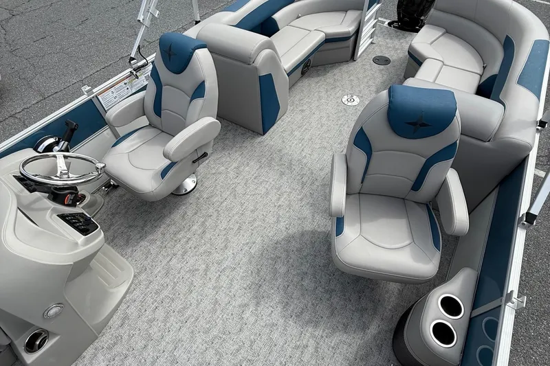 Slide: The Image of 2025 Berkshire 24RFX LE 2.75 pontoon boat interior with plush seating and modern helm. - 9