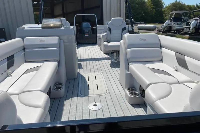 Slide: The Image of 2023 G3 Suncatcher Select Series 322RC pontoon boat interior with luxurious seating. - 9
