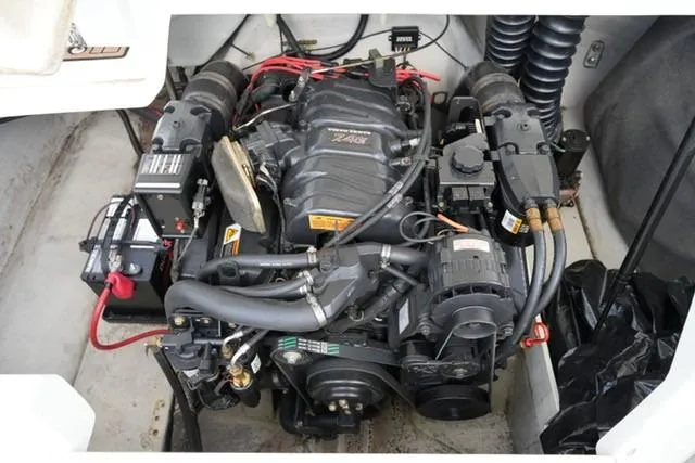 Slide: The Image of Engine of a 2000 Cobalt 226 boat, showcasing detailed components and wiring. - 11