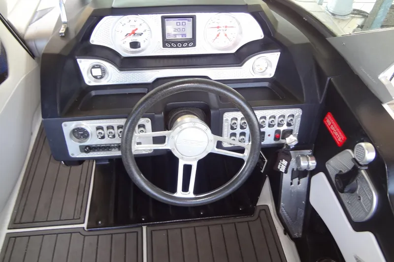 Slide: The Image of 2017 MB SPORTS F22 Tomcat dashboard with steering wheel and control panel. - 11