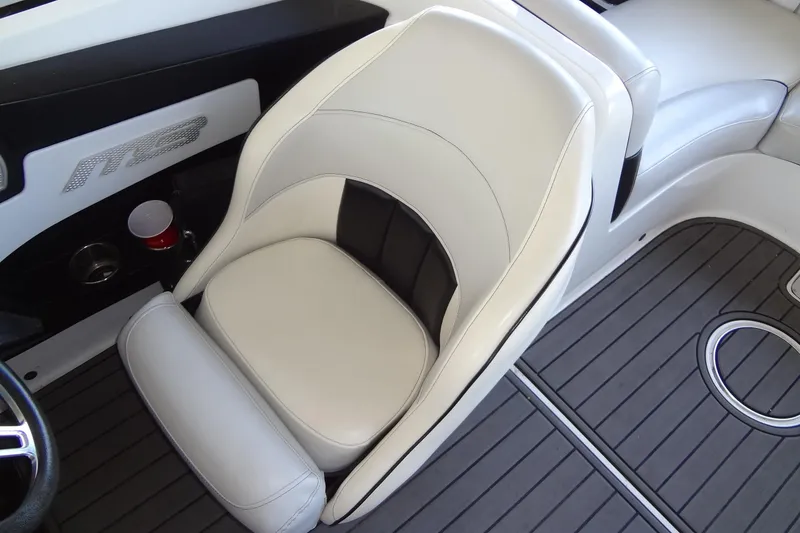 Slide: The Image of 2017 MB SPORTS F22 Tomcat boat interior with white and black seating. - 17