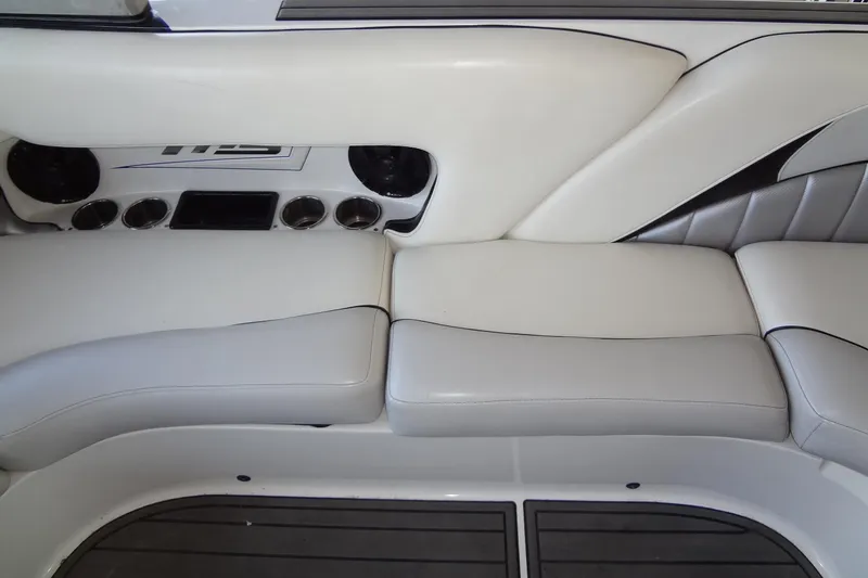 Slide: The Image of 2017 MB SPORTS F22 Tomcat interior with white leather seating and cup holders. - 19