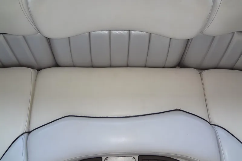 Slide: The Image of 2017 MB SPORTS F22 Tomcat boat interior with light gray seating upholstery. - 21