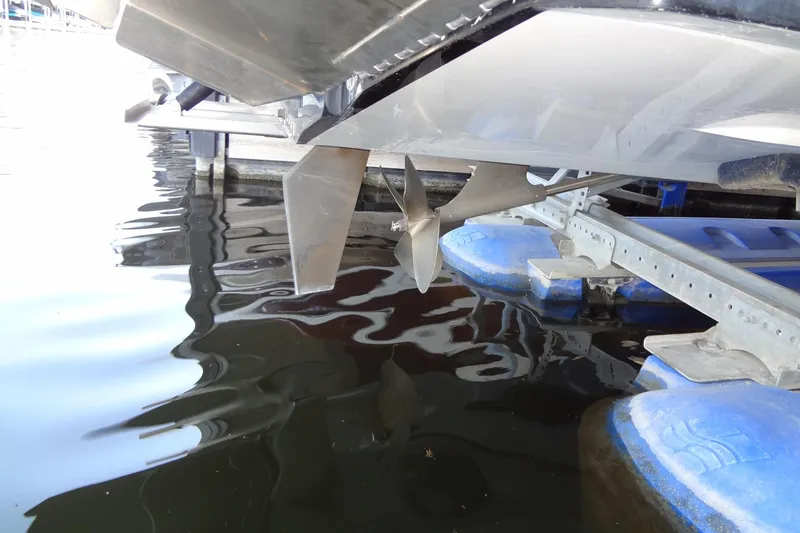 Slide: The Image of 2017 MB SPORTS F22 Tomcat boat propeller and hull on water. - 35