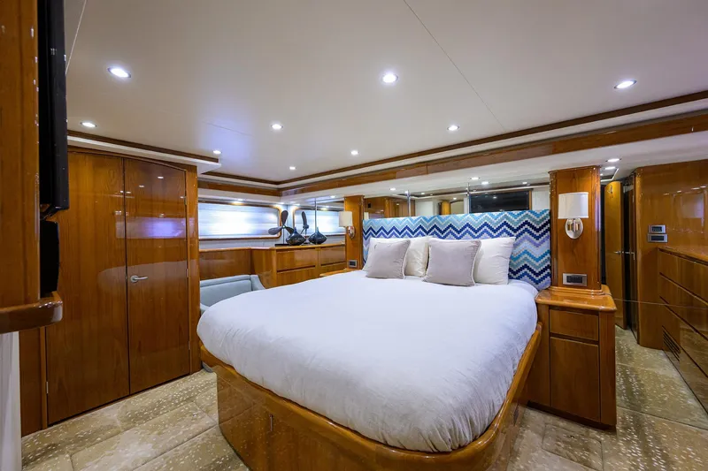 Slide: The Image of Luxurious bedroom interior of 2014 Viking 76 Enclosed Bridge Convertible yacht. - 20