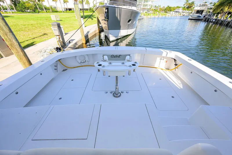 Slide: The Image of 2014 Viking 76 Enclosed Bridge Convertible yacht deck, featuring spacious fishing area. - 62