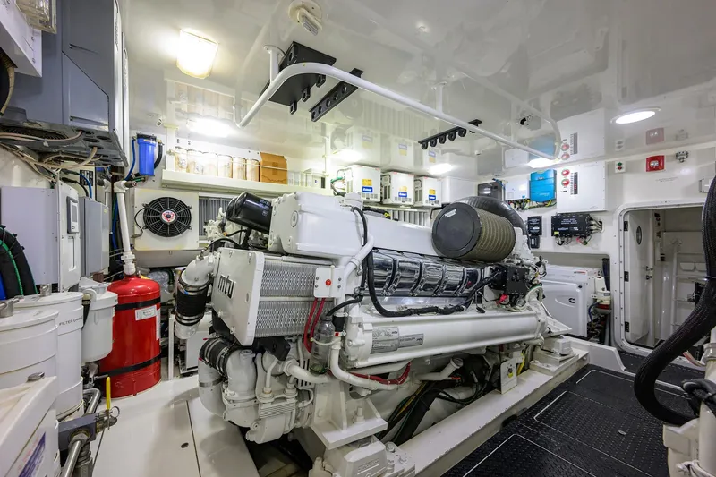 Slide: The Image of Engine room of 2014 Viking 76 Enclosed Bridge Convertible yacht, featuring MTU engine. - 68