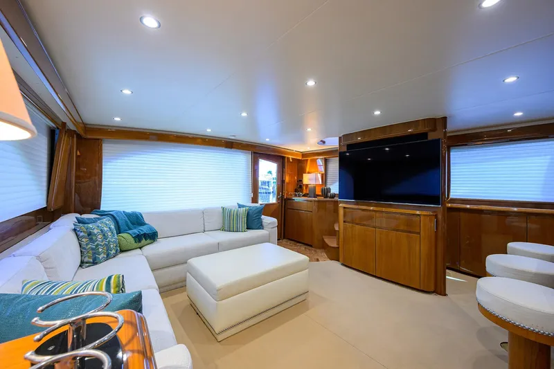 Slide: The Image of Luxurious interior of 2014 Viking 76 Enclosed Bridge Convertible yacht with modern furnishings. - 7