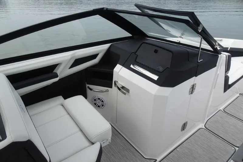 Slide: The Image of 2026 Cobalt R6 boat interior with sleek seating and modern dashboard design. - 14