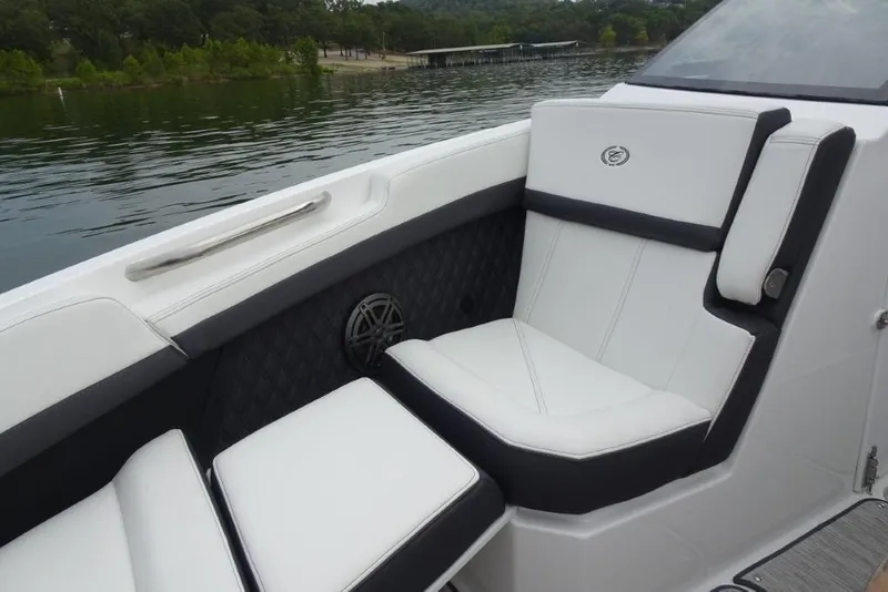 Slide: The Image of Luxurious seating on 2026 Cobalt R6 boat, featuring sleek white and black upholstery. - 18