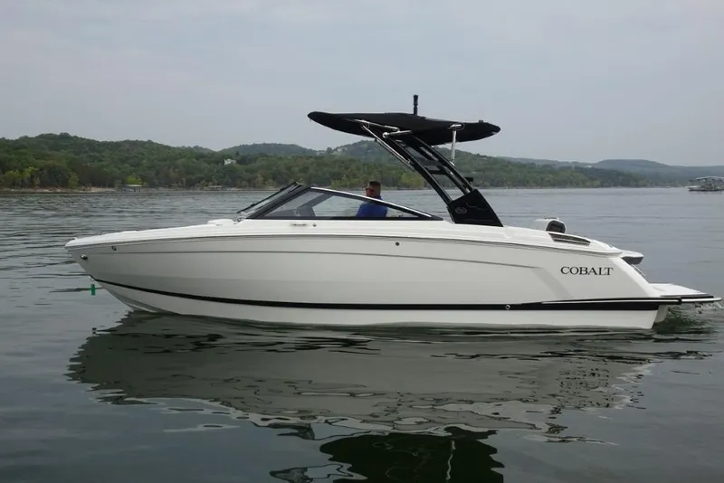 Slide: The Image of 2026 Cobalt R6 boat on a calm lake with scenic background. - 4