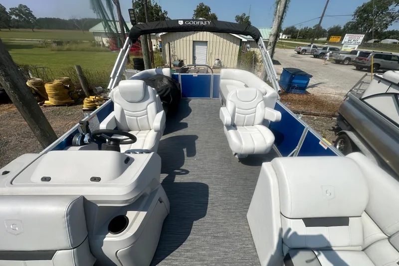 Slide: The Image of 2024 Godfrey SWEETWATER 2286 SB pontoon boat with spacious seating and modern design. - 26