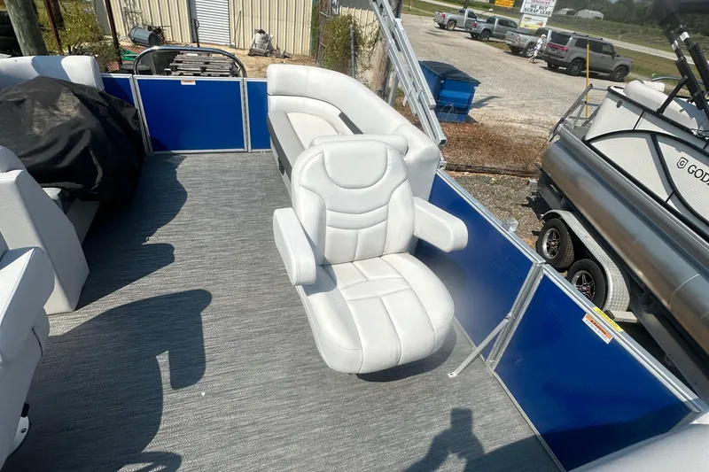 Slide: The Image of 2024 Godfrey SWEETWATER 2286 SB pontoon boat interior with white seating. - 27