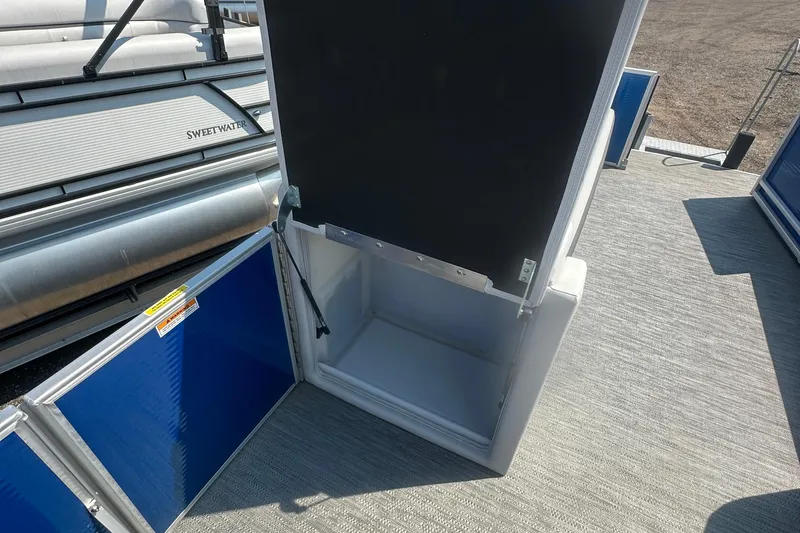 Slide: The Image of Open storage compartment on 2024 Godfrey SWEETWATER 2286 SB pontoon boat. - 35