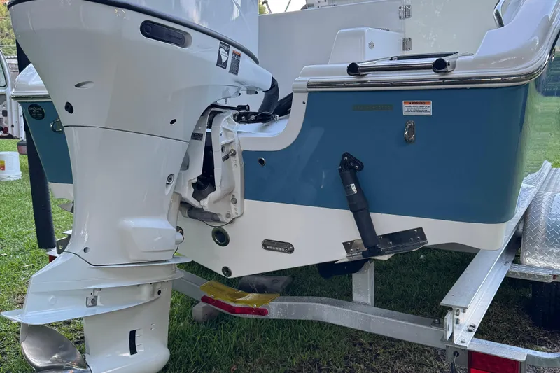 Slide: The Image of 2022 Sea Pro 219 Center Console boat on trailer, featuring outboard motor. - 3