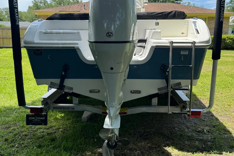 Slide: The Image of 2022 Sea Pro 219 Center Console boat on trailer, rear view with outboard motor. - 4