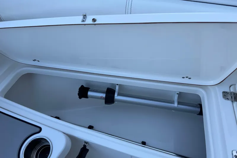 Slide: The Image of Open storage compartment in 2022 Sea Pro 219 Center Console boat. - 8