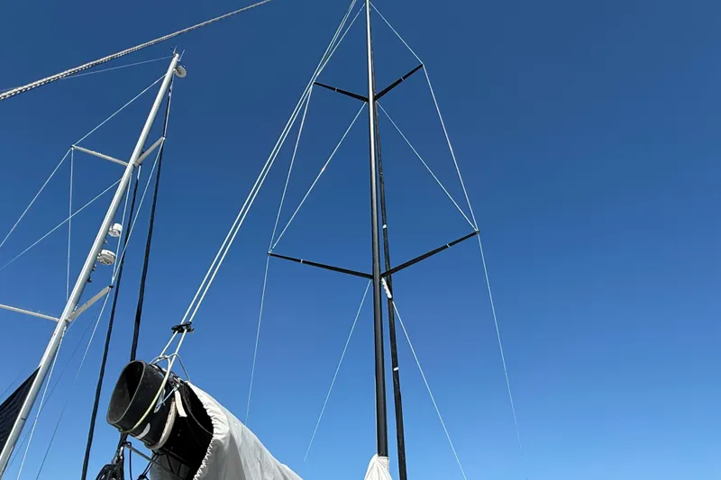 Slide: The Image of Sailboat masts against clear blue sky, J Boats J/121, 2018 model. - 11