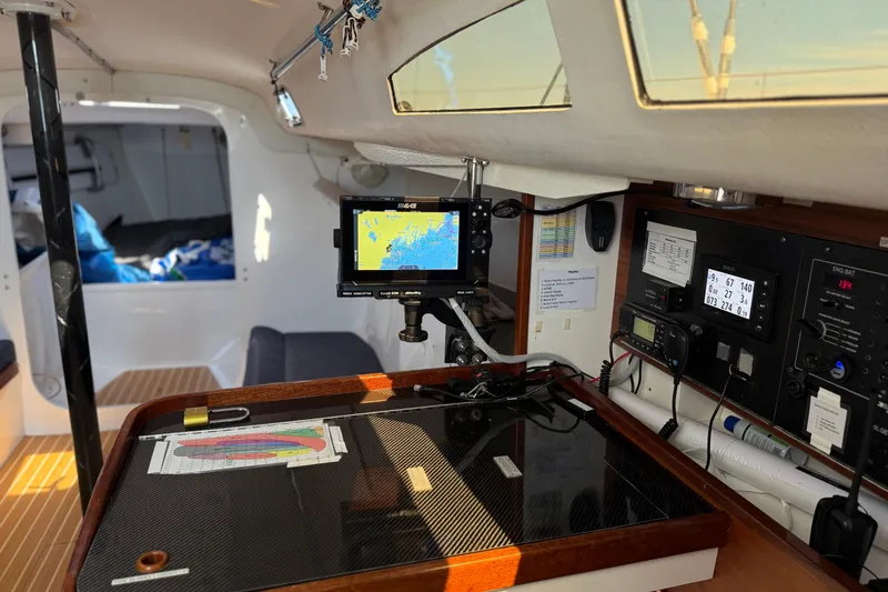 Slide: The Image of Interior of 2018 J Boats J/121 sailboat with navigation equipment and control panel. - 19