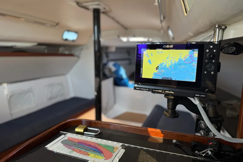 Slide: The Image of Interior of 2018 J Boats J/121 with navigation equipment and chart. - 20