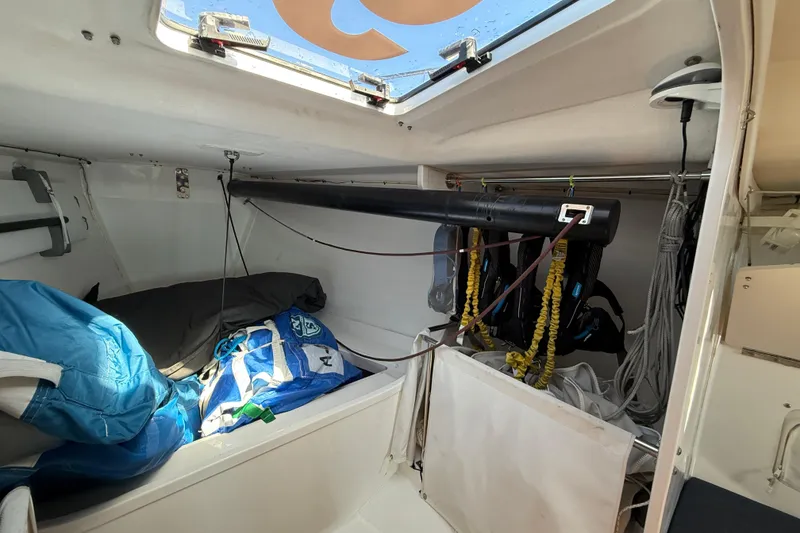 Slide: The Image of Interior of 2018 J Boats J/121 sailboat with stored gear and equipment. - 26
